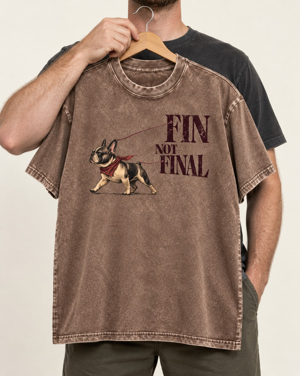Frenchie Fin Not Final Washed Tee in Coffee, held up on a hanger