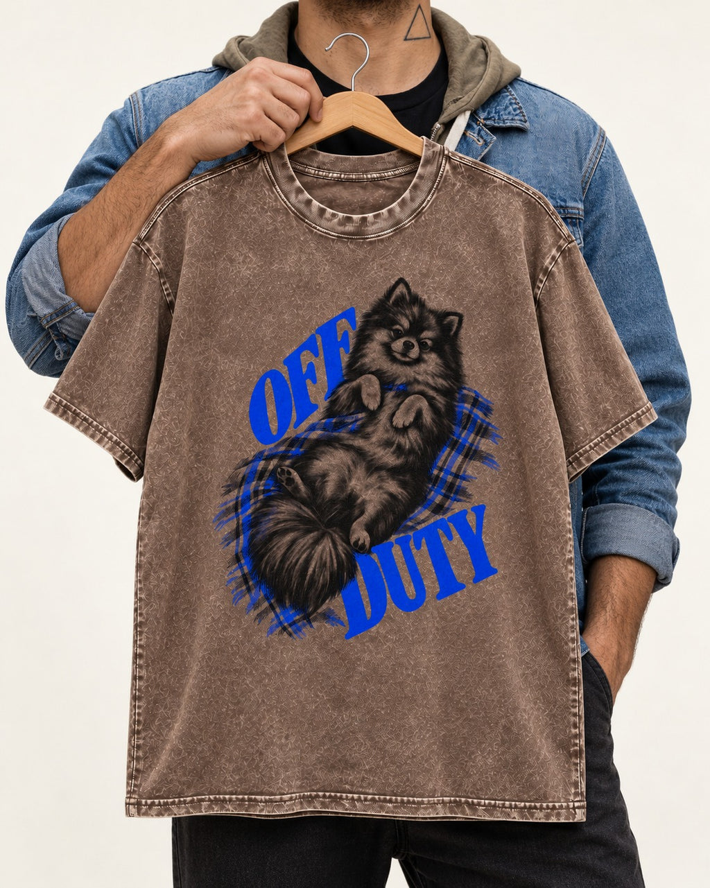 Off Duty Pomeranian Washed Tee in Coffee, held up on a hanger