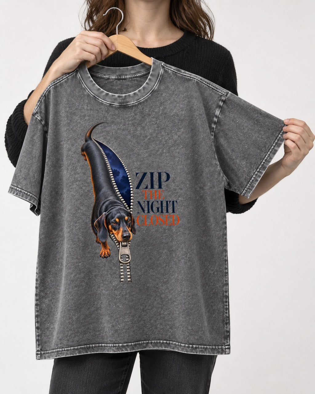 Zip the Night Closed Dachshund Washed Tee in Gray, held up on a hanger