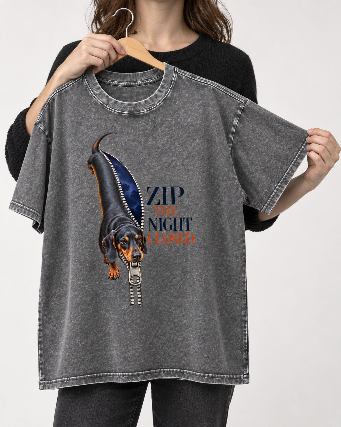 Zip the Night Closed Dachshund Washed Tee in Gray, held up on a hanger