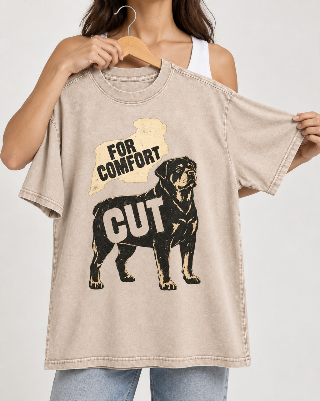 Rottweiler Cut for Comfort Washed Tee in Apricot, held up on a hanger