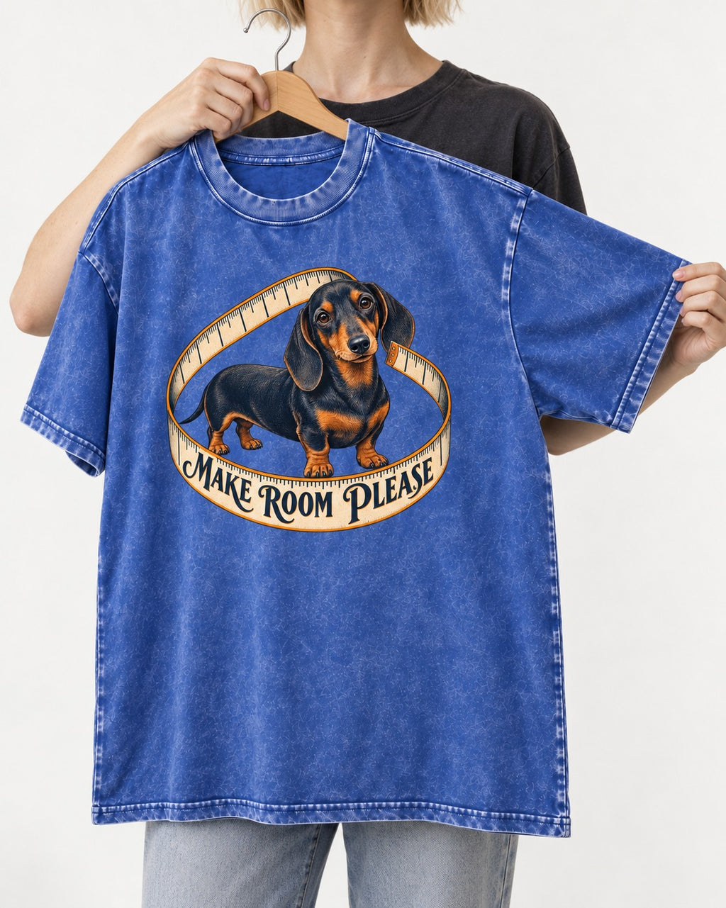 Dachshund Make Room Please Measuring Tape Graphic Washed Tee in Royal Blue, held up on a hanger