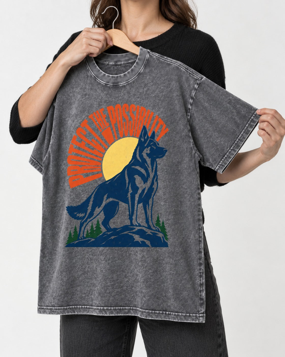 German Shepherd Dog Protect the Possibility Washed Tee in Gray, held up on a hanger