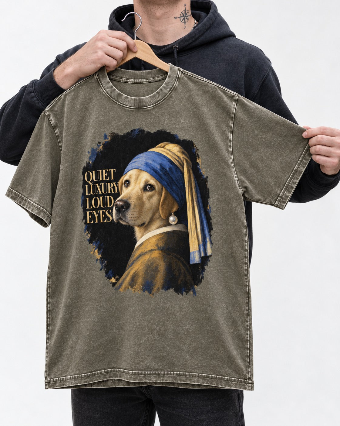 Labrador Retriever Quiet Luxury Loud Eyes Pearl Earring Graphic Washed Tee in Army Green, held up on a hanger