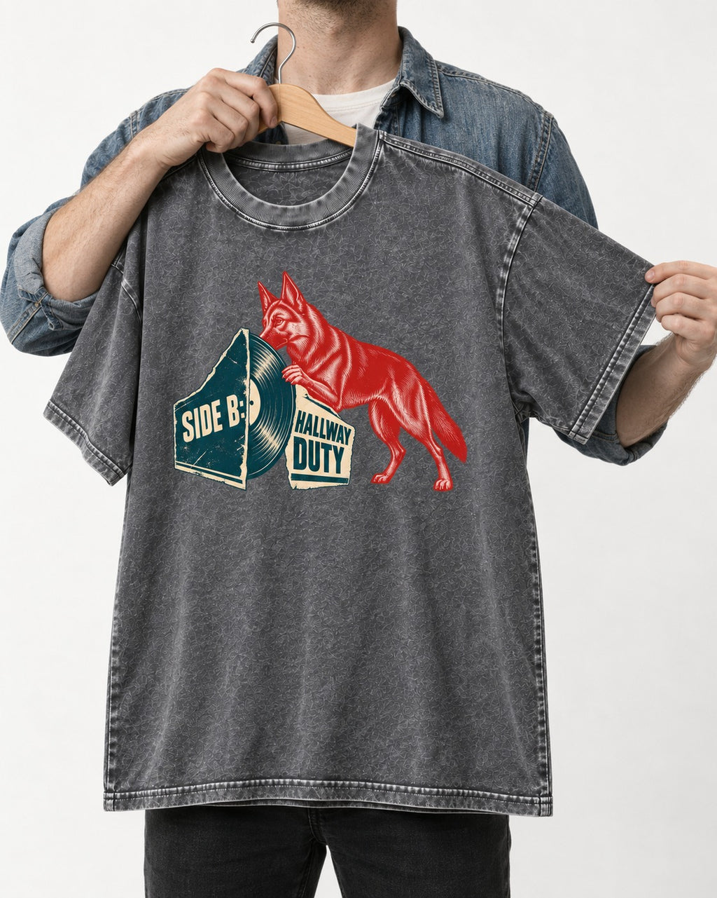 Side B Hallway Duty Vinyl Record German Shepherd Dog Graphic Washed Tee in Gray, held up on a hanger