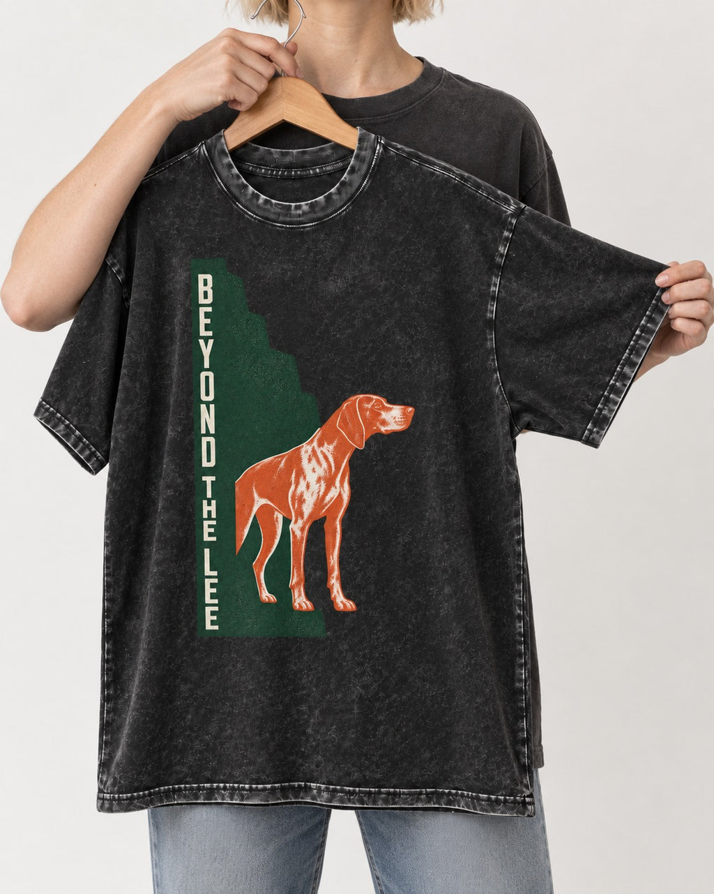 German Shorthaired Pointer Beyond the Lee Monument Graphic Washed Tee in Black, held up on a hanger