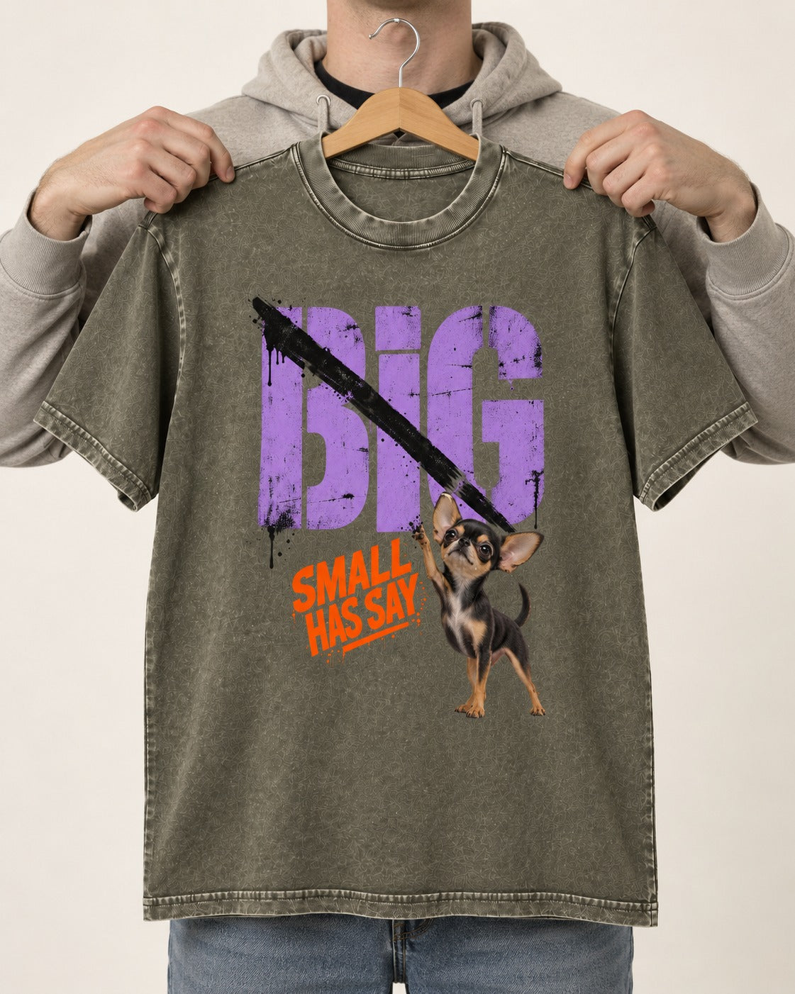 Chihuahua Big Small Has Say Diagonal Slash Graphic Washed Tee in Army Green, held up on a hanger