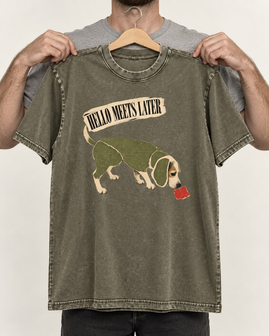 Twenty Minutes Later Beagle Washed Tee in Army Green, held up on a hanger