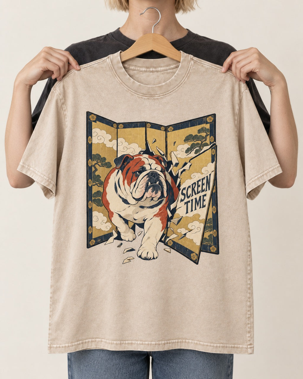 English Bulldog Screen Time Washed Tee in Apricot, held up on a hanger