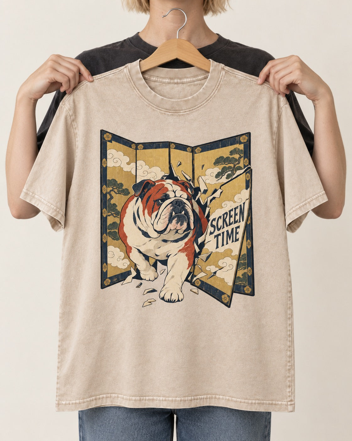English Bulldog Screen Time Washed Tee in Apricot, held up on a hanger