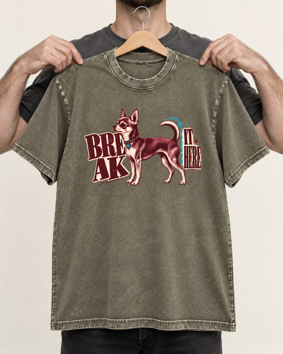 Chihuahua Break It Here Perforation Graphic Washed Tee in Army Green, held up on a hanger