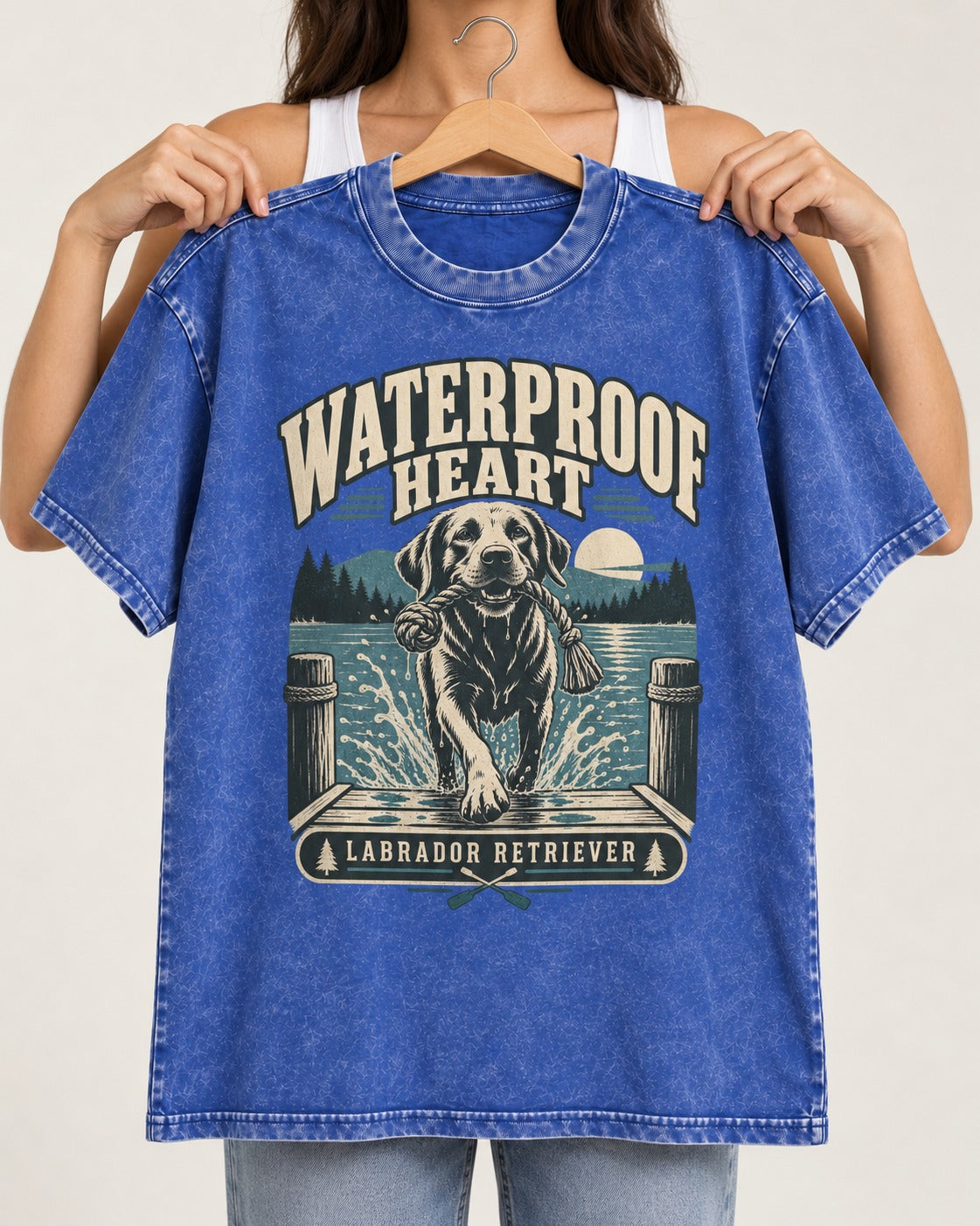 Labrador Retriever Waterproof Heart Lake Adventure Graphic Washed Tee in Royal Blue, held up on a hanger