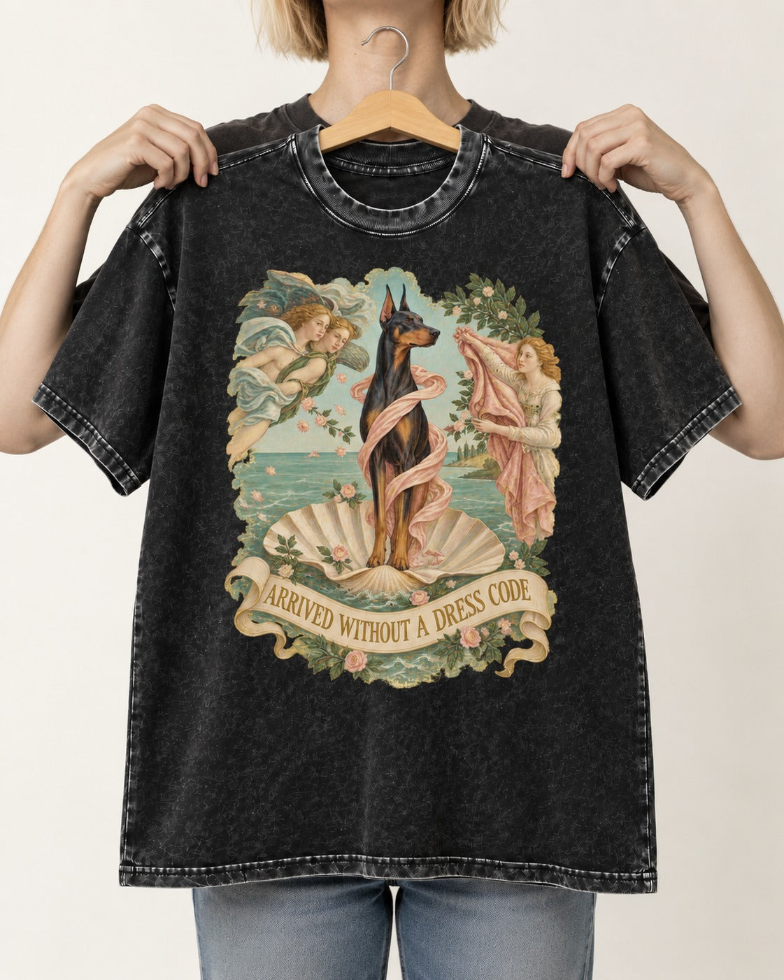 Doberman Arrived Without a Dress Code Renaissance Graphic Washed Tee in Black, held up on a hanger