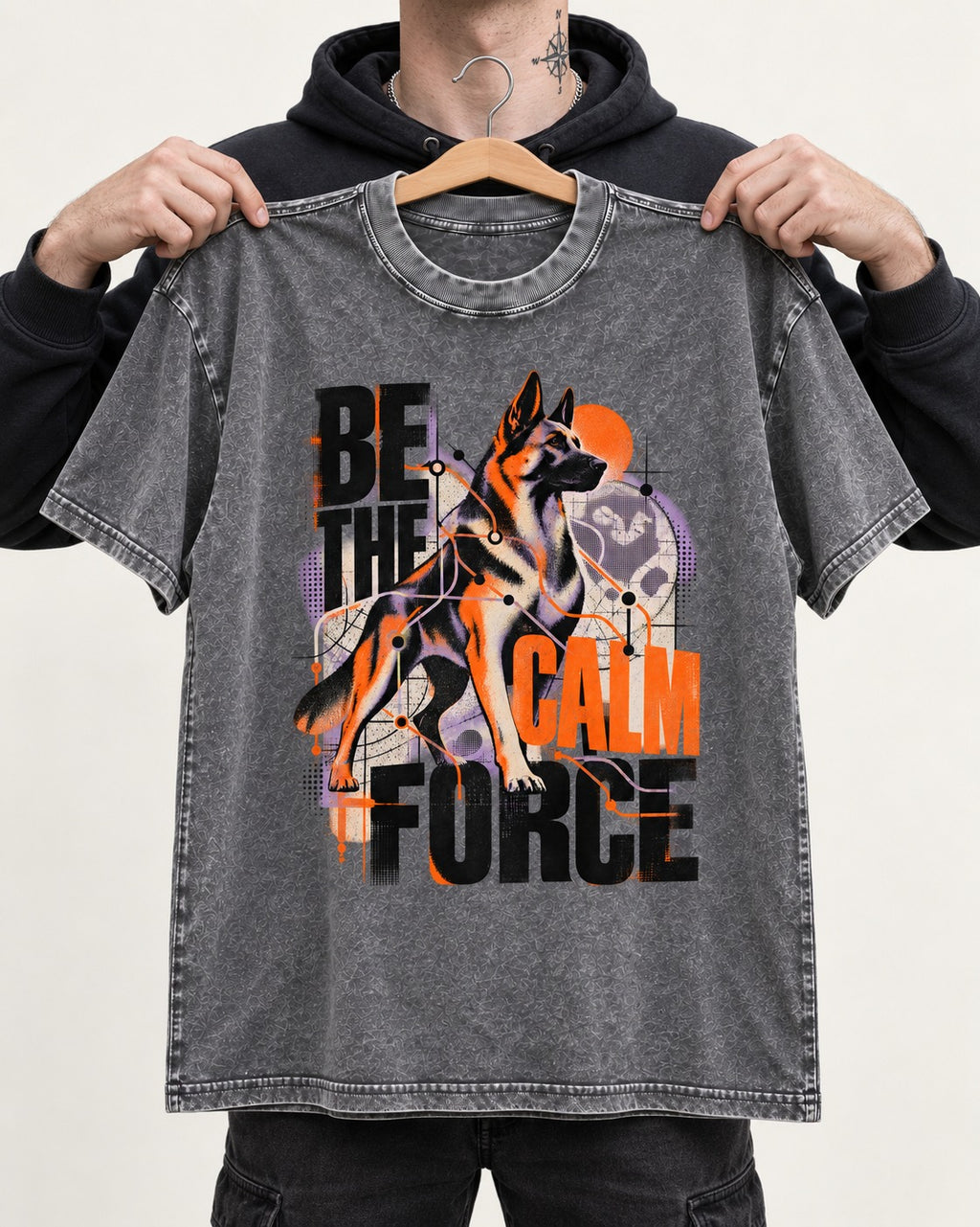 Be the Calm Force German Shepherd Dog Washed Tee in Gray, held up on a hanger