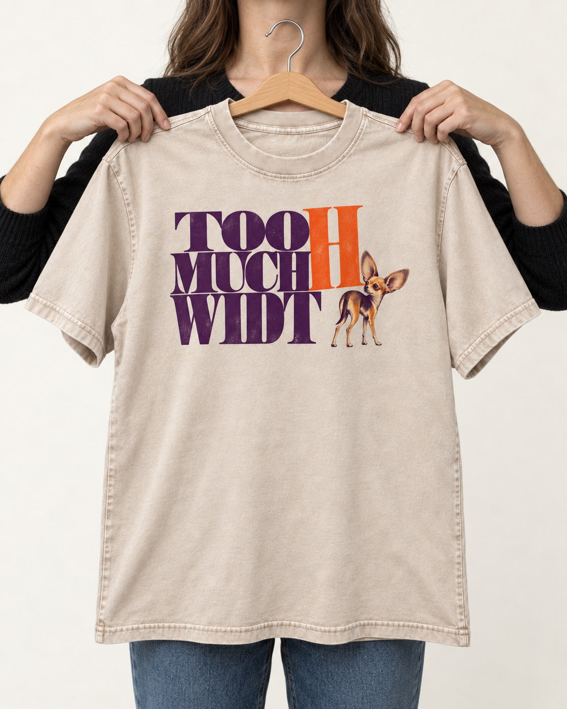 Too Much Width Chihuahua Washed Tee in Apricot, held up on a hanger