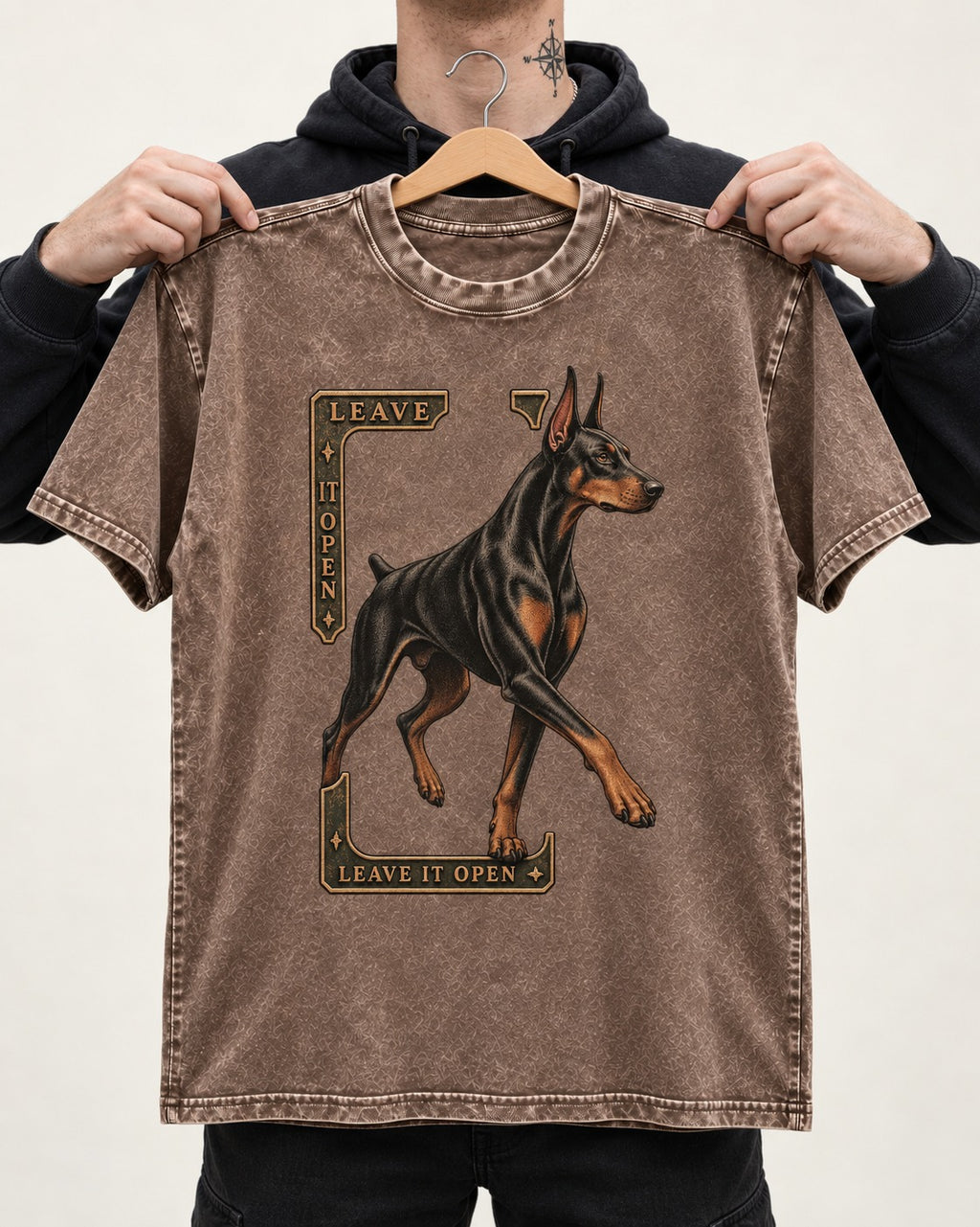 Leave It Open Doberman Washed Tee in Coffee, held up on a hanger