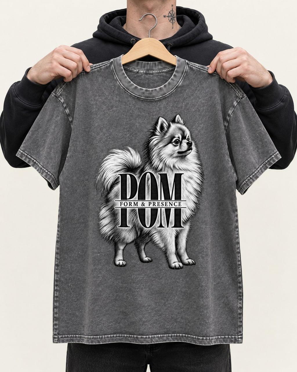 Pomeranian Form and Presence Monogram Graphic Washed Tee in Gray, held up on a hanger