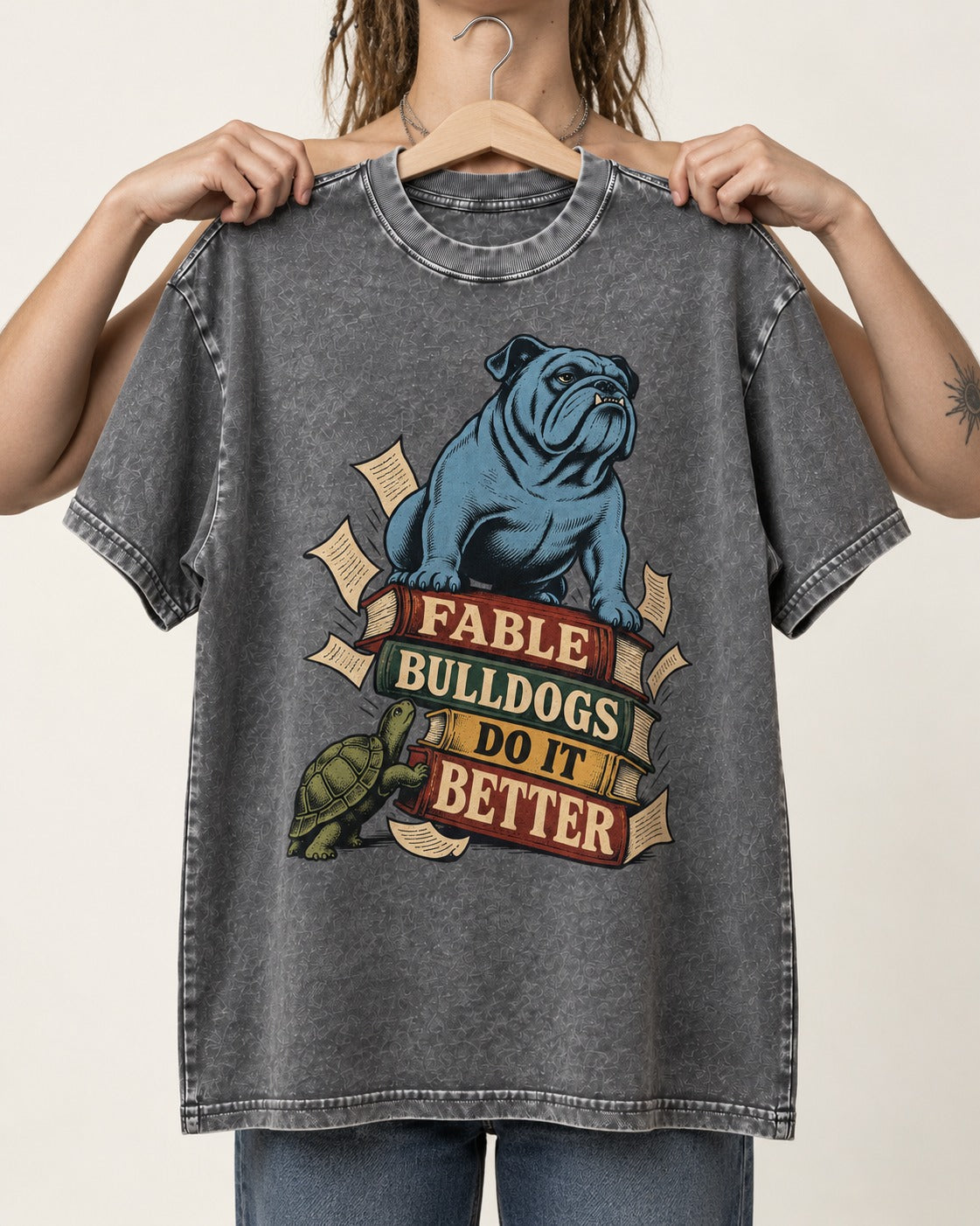 English Bulldog Does It Better Washed Tee in Gray, held up on a hanger