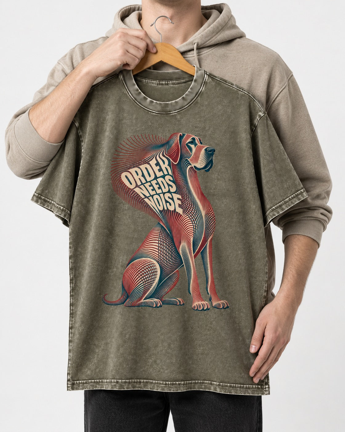 Great Dane Order Needs Noise Optical Line Graphic Washed Tee in Army Green, held up on a hanger