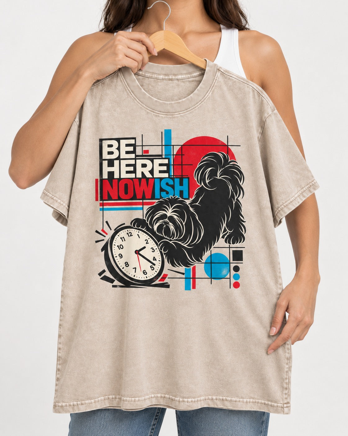 Be Here Nowish Shih Tzu Washed Tee in Apricot, held up on a hanger