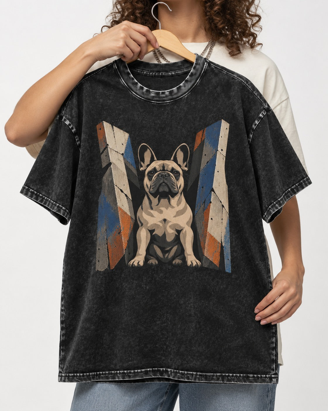 Frenchie Concrete Diplomat Barrier Portrait Washed Tee in Black, held up on a hanger