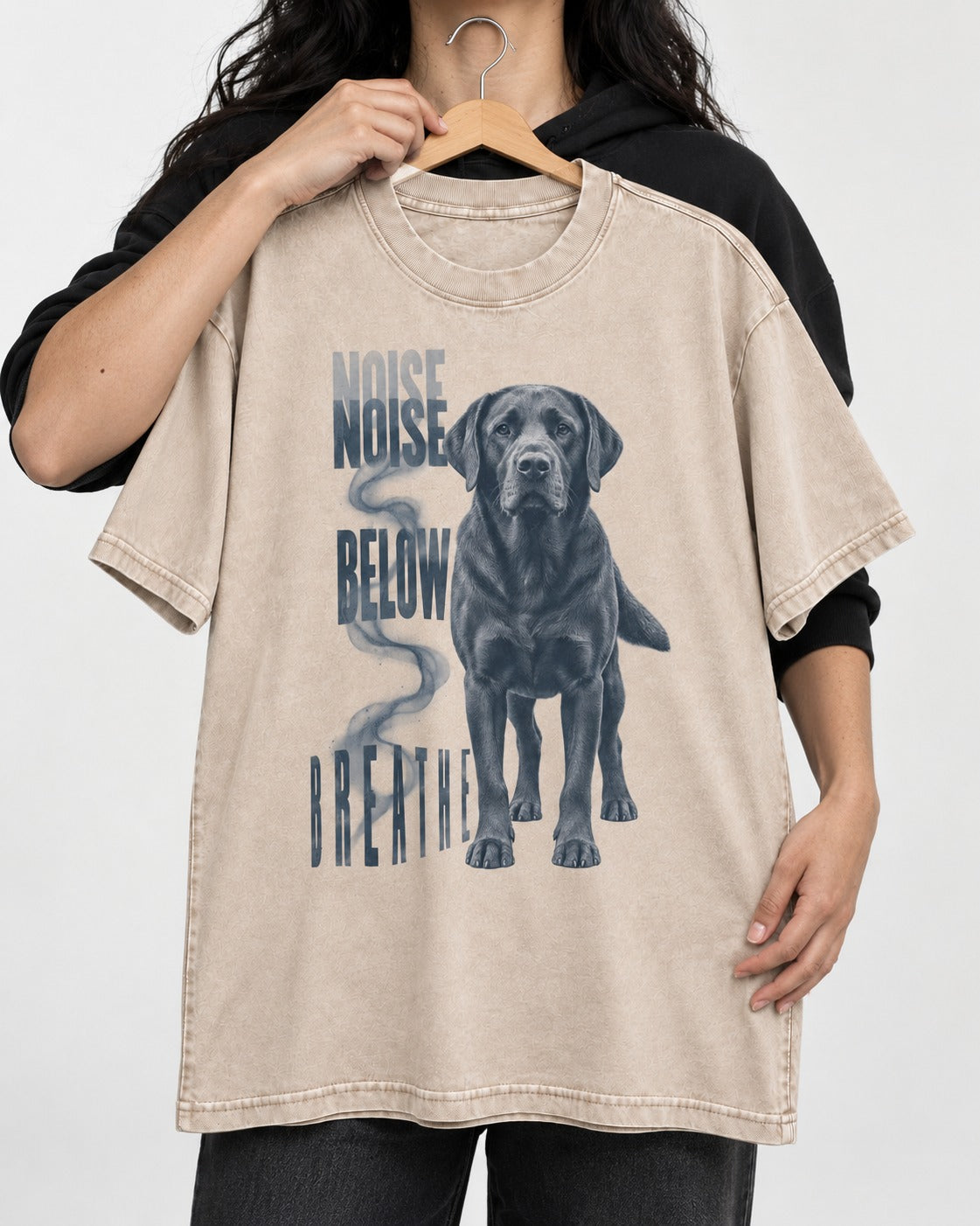 Labrador Retriever Breathe Below the Noise Washed Tee in Apricot, held up on a hanger