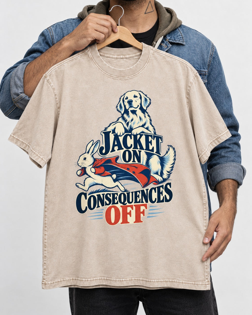 Golden Retriever Jacket On Consequences Off Rabbit Chase Graphic Washed Tee in Apricot, held up on a hanger