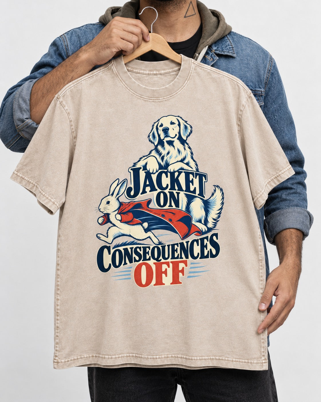 Golden Retriever Jacket On Consequences Off Rabbit Chase Graphic Washed Tee in Apricot, held up on a hanger
