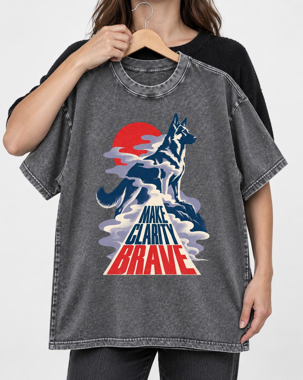 Make Clarity Brave Mountain German Shepherd Dog Graphic Washed Tee in Gray, held up on a hanger