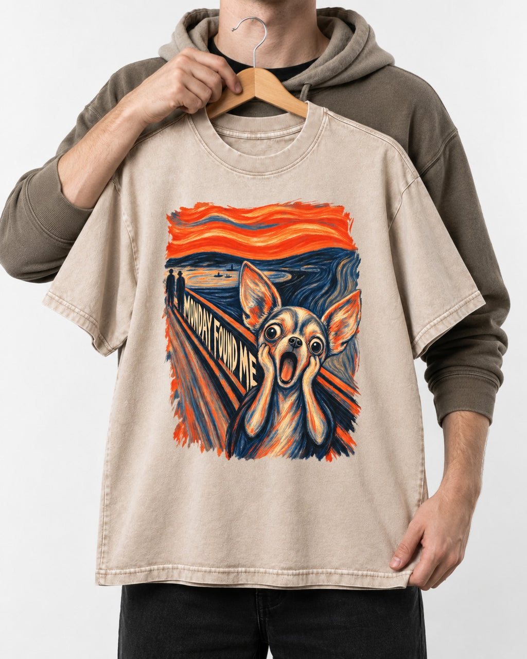 Monday Found Me Chihuahua Scream Path Washed Tee in Apricot, held up on a hanger