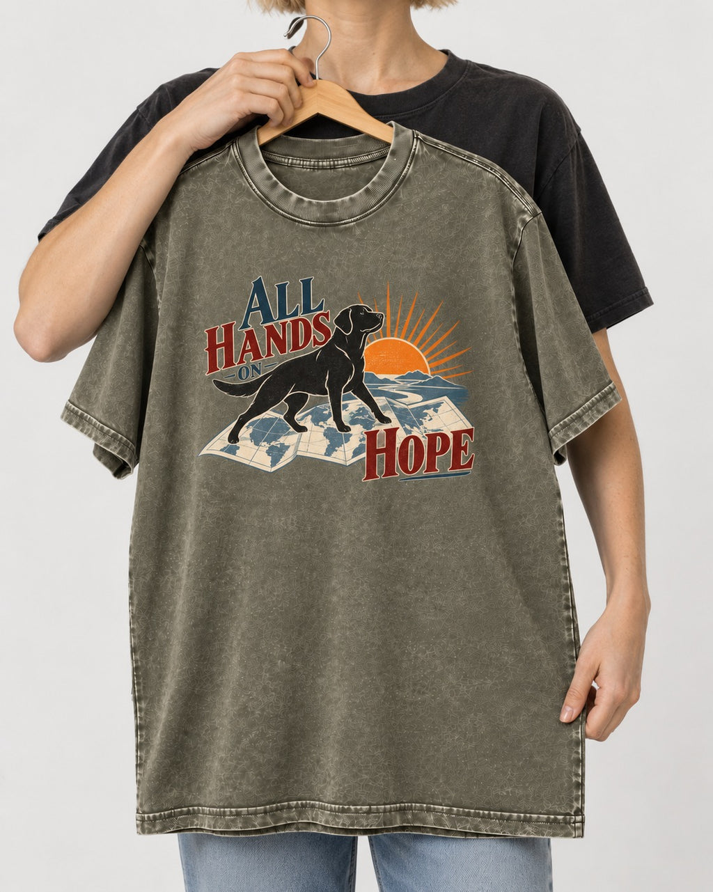 Labrador Retriever All Hands on Hope Map Sunrise Graphic Washed Tee in Army Green, held up on a hanger