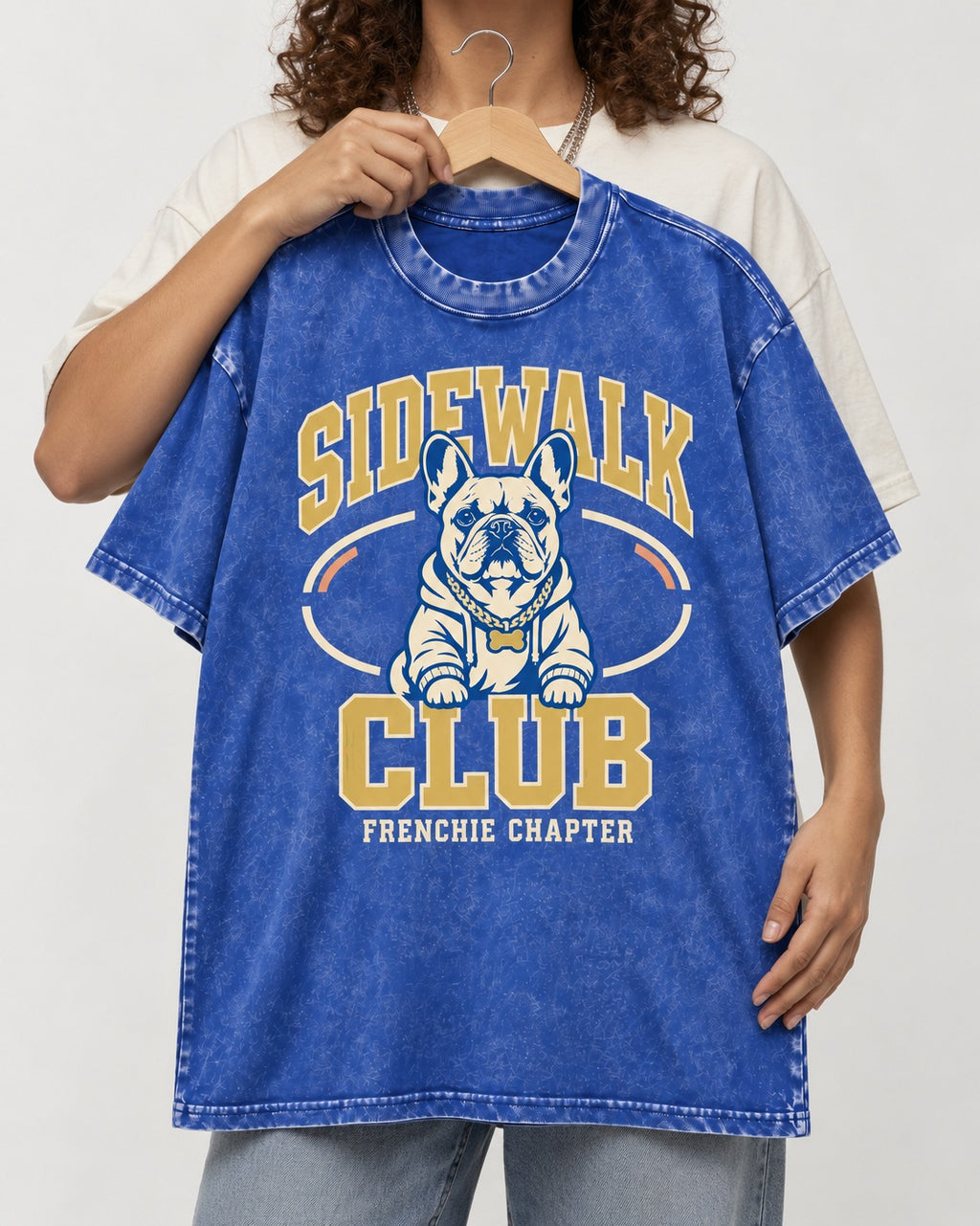 Frenchie Sidewalk Club Chapter Graphic Washed Tee in Royal Blue, held up on a hanger