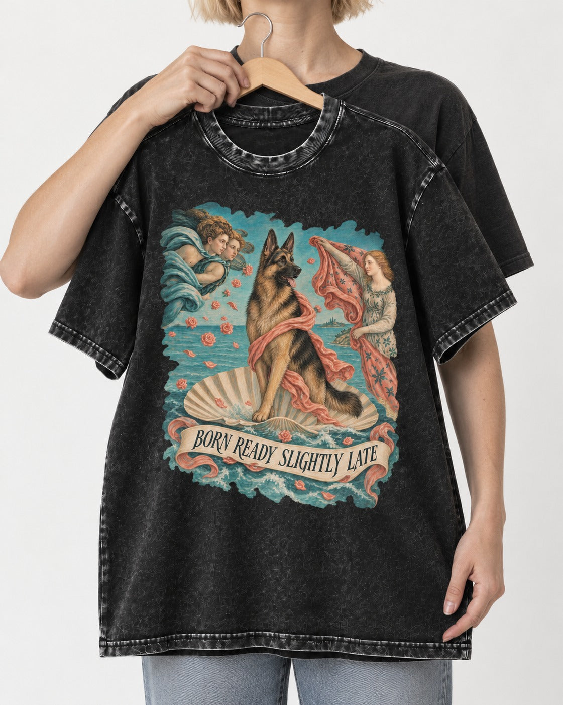 German Shepherd Dog Born Ready Slightly Late Venus Graphic Washed Tee in Black, held up on a hanger