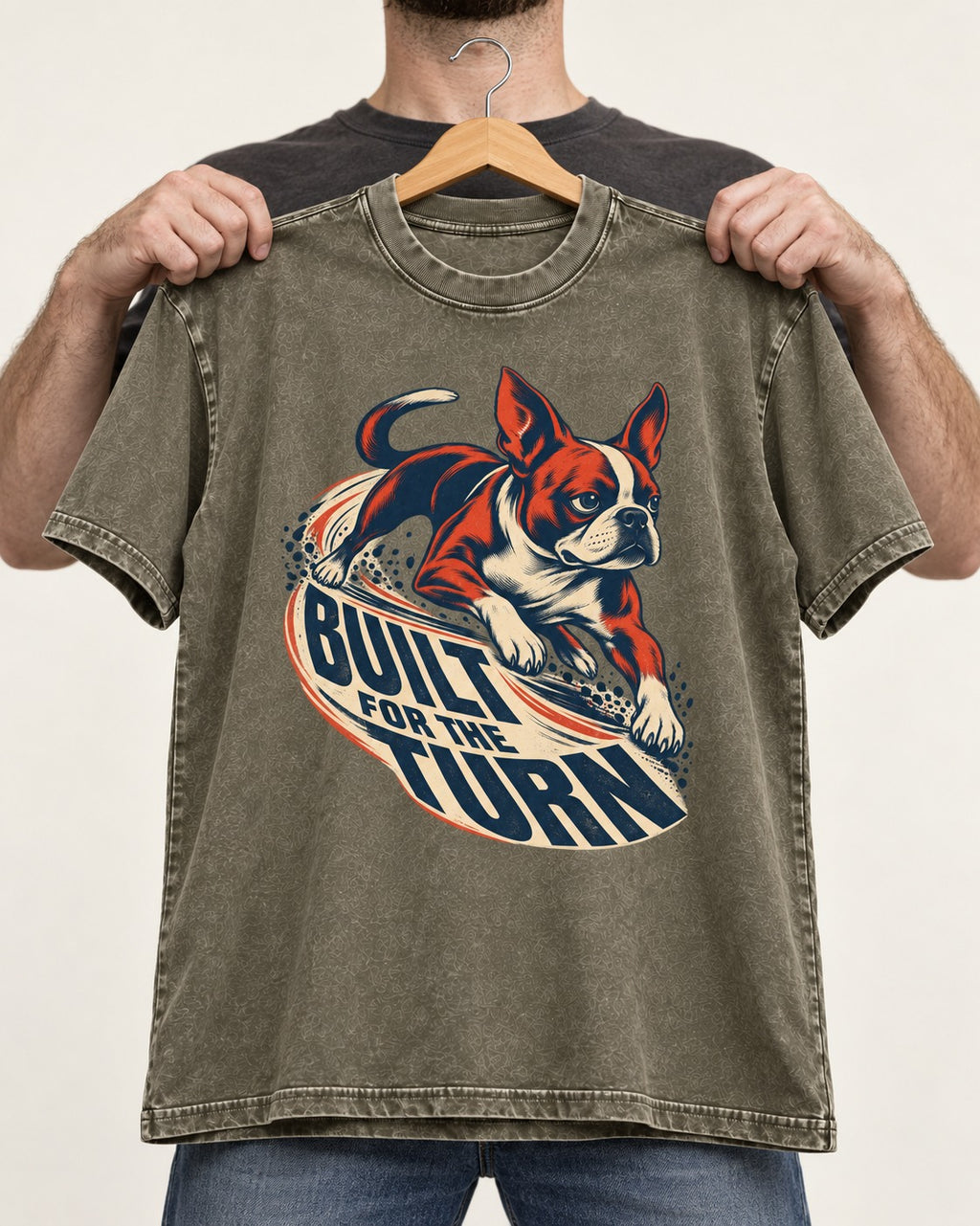 Built for the Turn Boston Terrier Washed Tee in Army Green, held up on a hanger