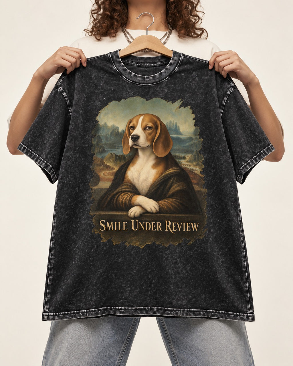 Smile Under Review Beagle Portrait Washed Tee in Black, held up on a hanger