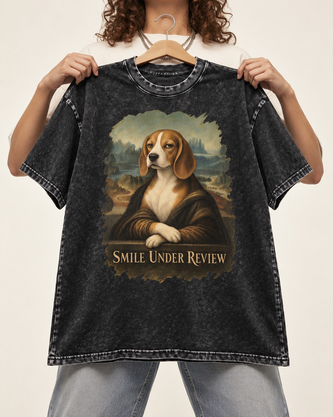Smile Under Review Beagle Portrait Washed Tee in Black, held up on a hanger
