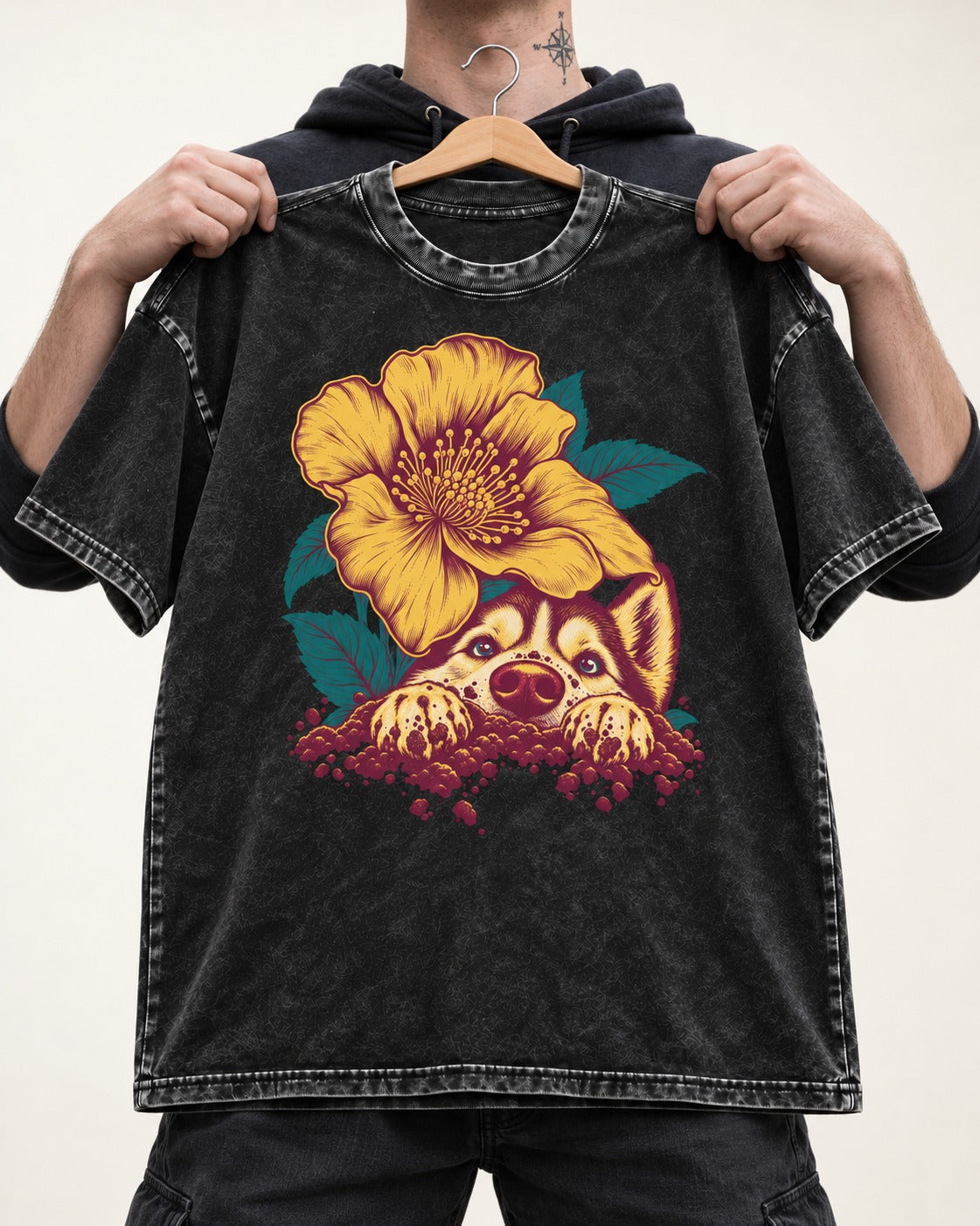 Husky Flower Witness Peeking Floral Graphic Washed Tee in Black, held up on a hanger