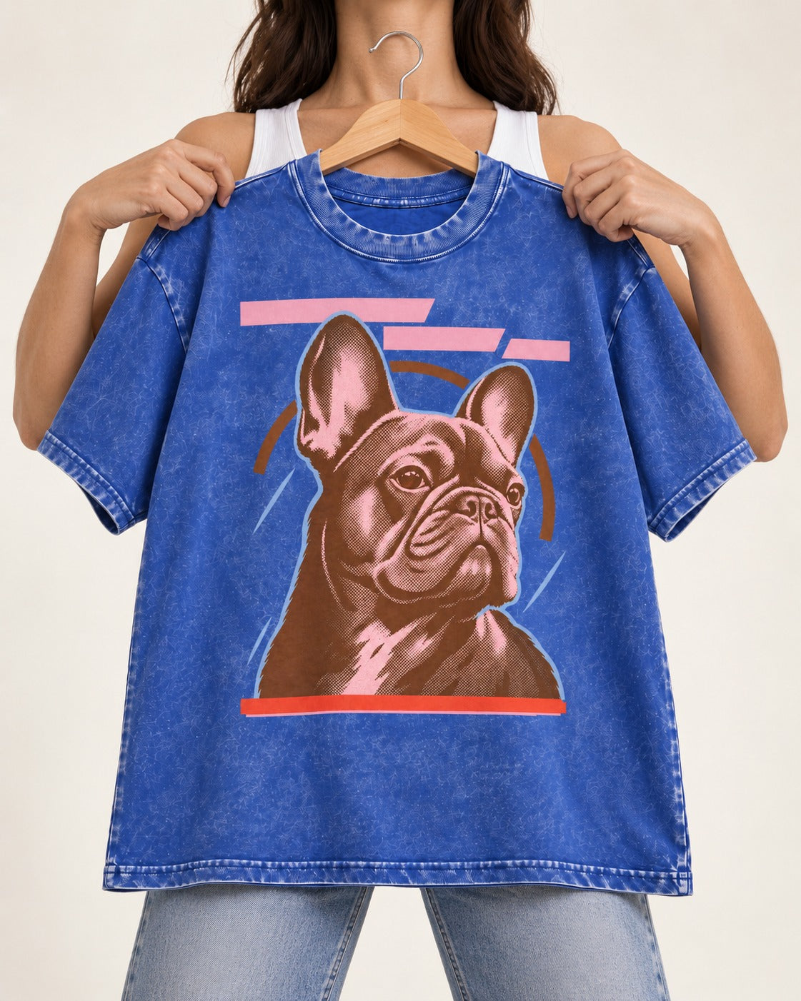 Frenchie Geometric Portrait Graphic Washed Tee in Royal Blue, held up on a hanger