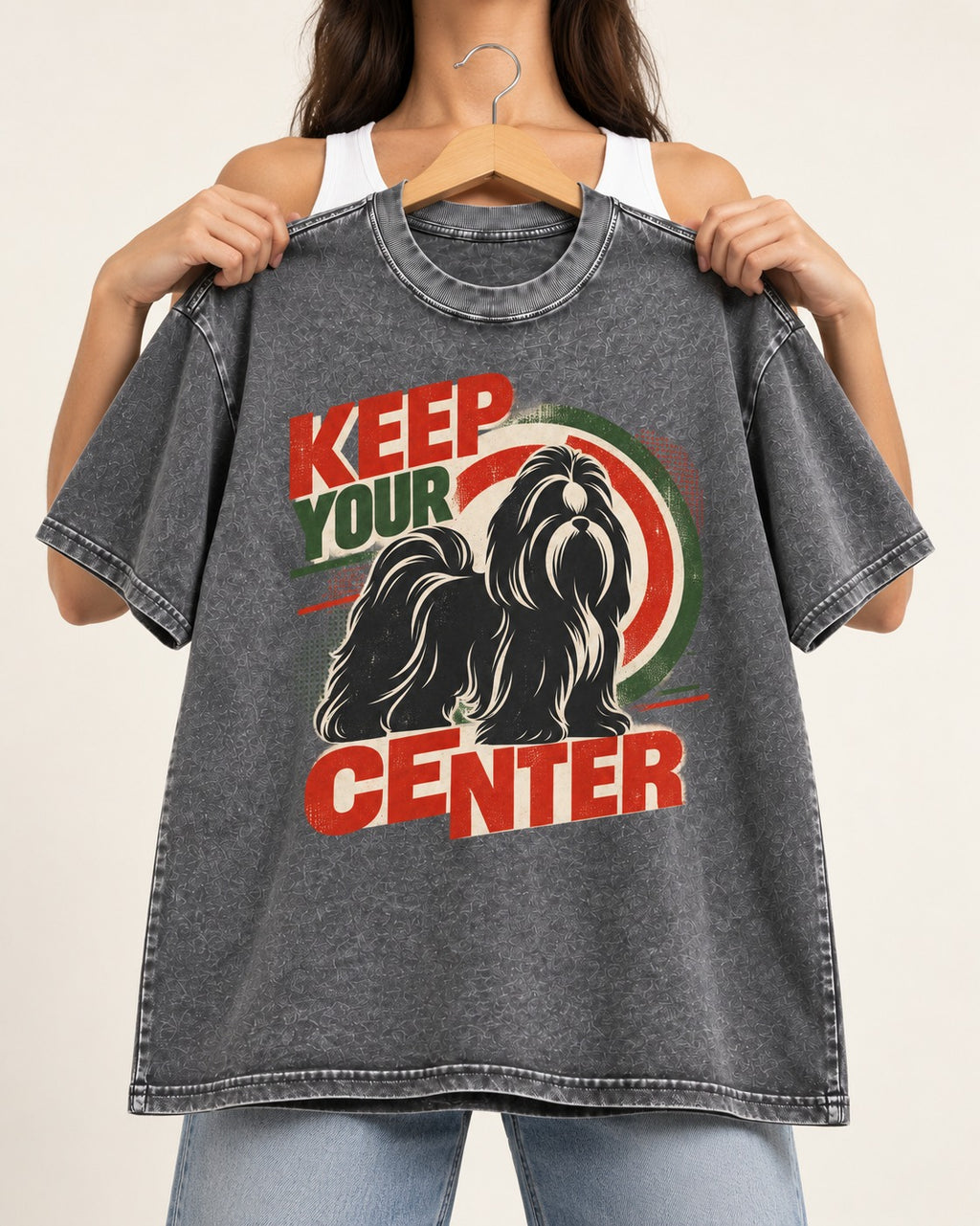 Shih Tzu Keep Your Center Retro Target Graphic Washed Tee in Gray, held up on a hanger