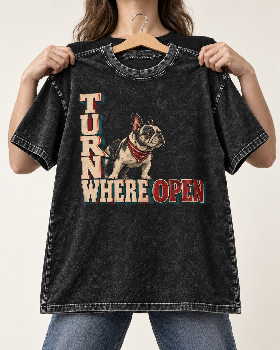 Turn Where Open Frenchie Washed Tee in Black, held up on a hanger