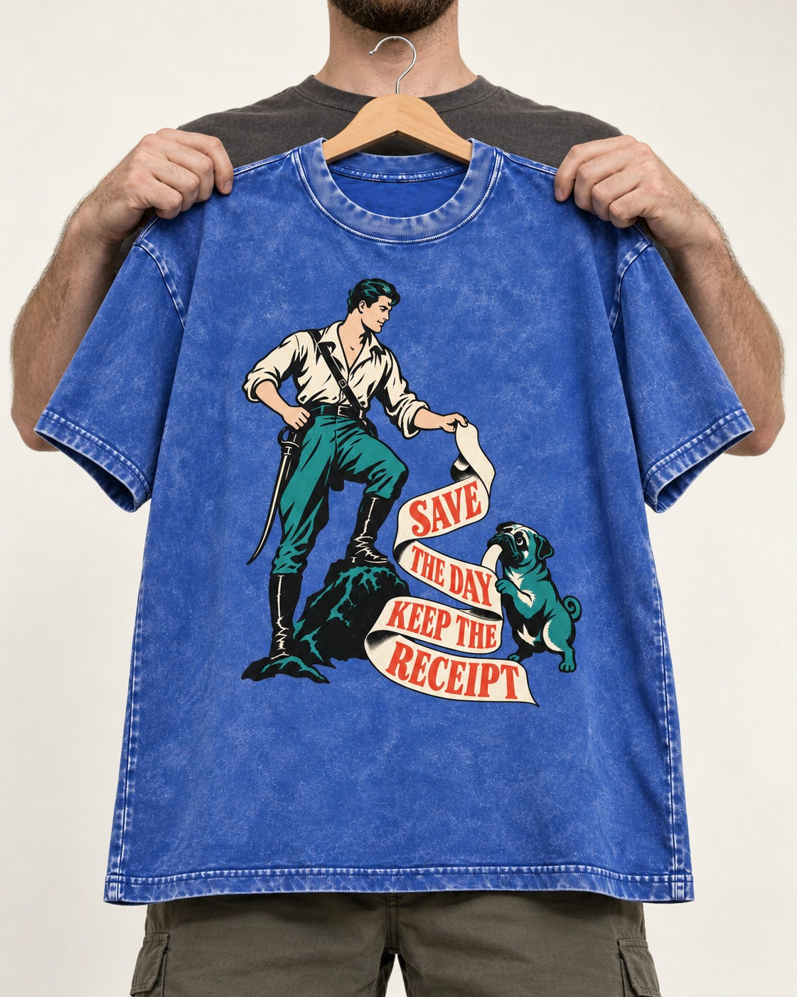 Pug Save the Day Keep the Receipt Hero Graphic Washed Tee in Royal Blue, held up on a hanger