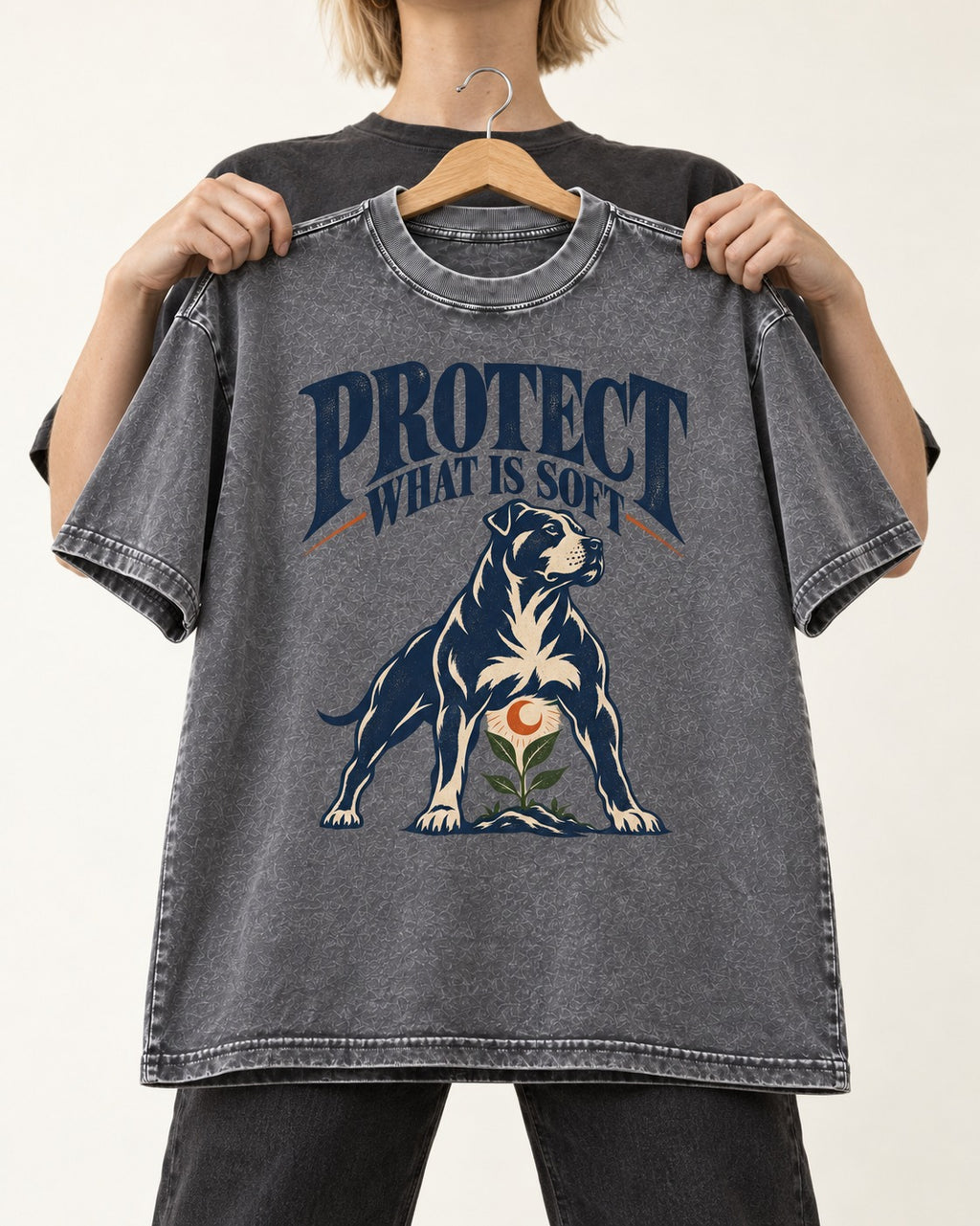 Protect What Is Soft Pitbull Washed Tee in Gray, held up on a hanger