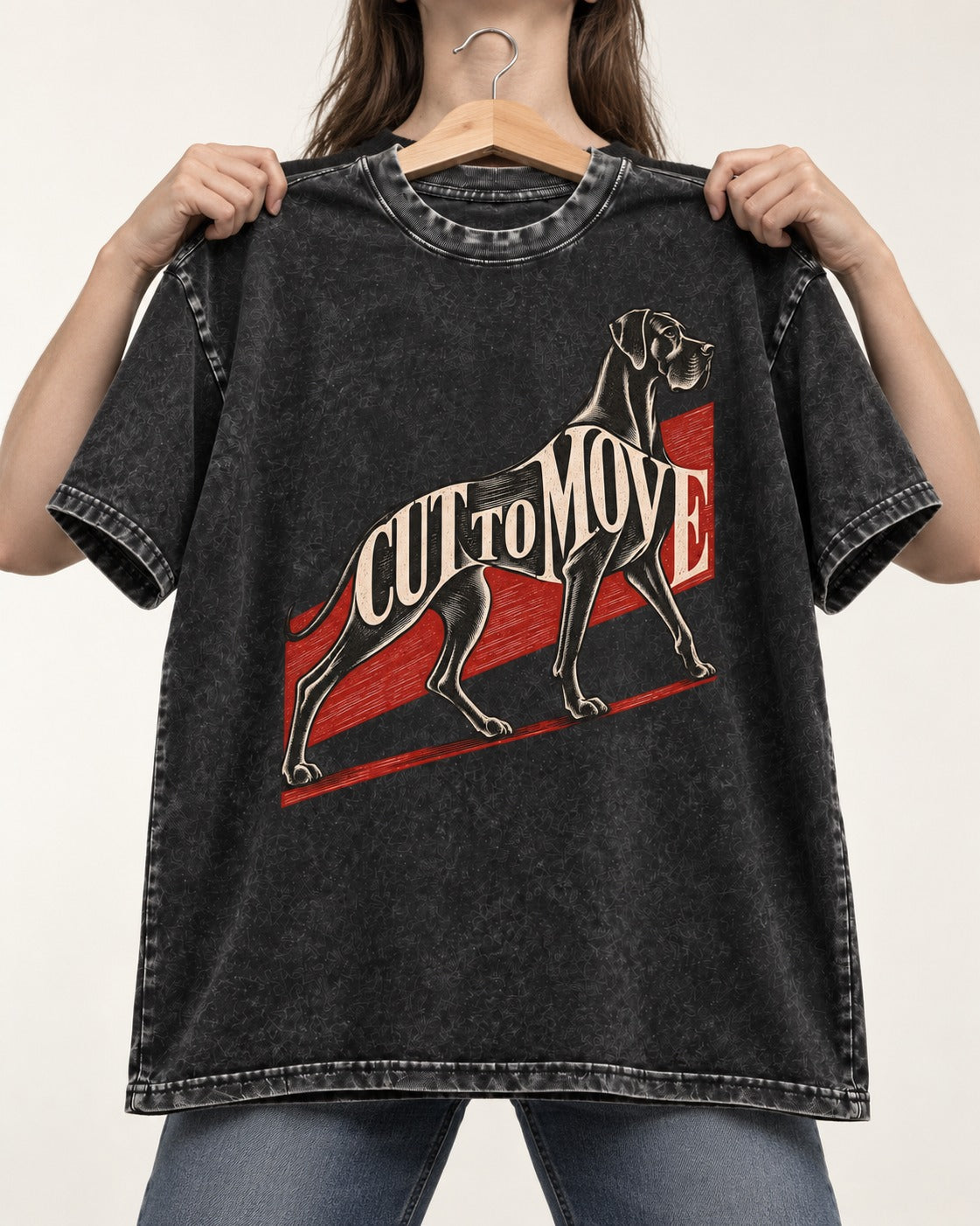 Great Dane Cut to Move Walking Typography Graphic Washed Tee in Black, held up on a hanger