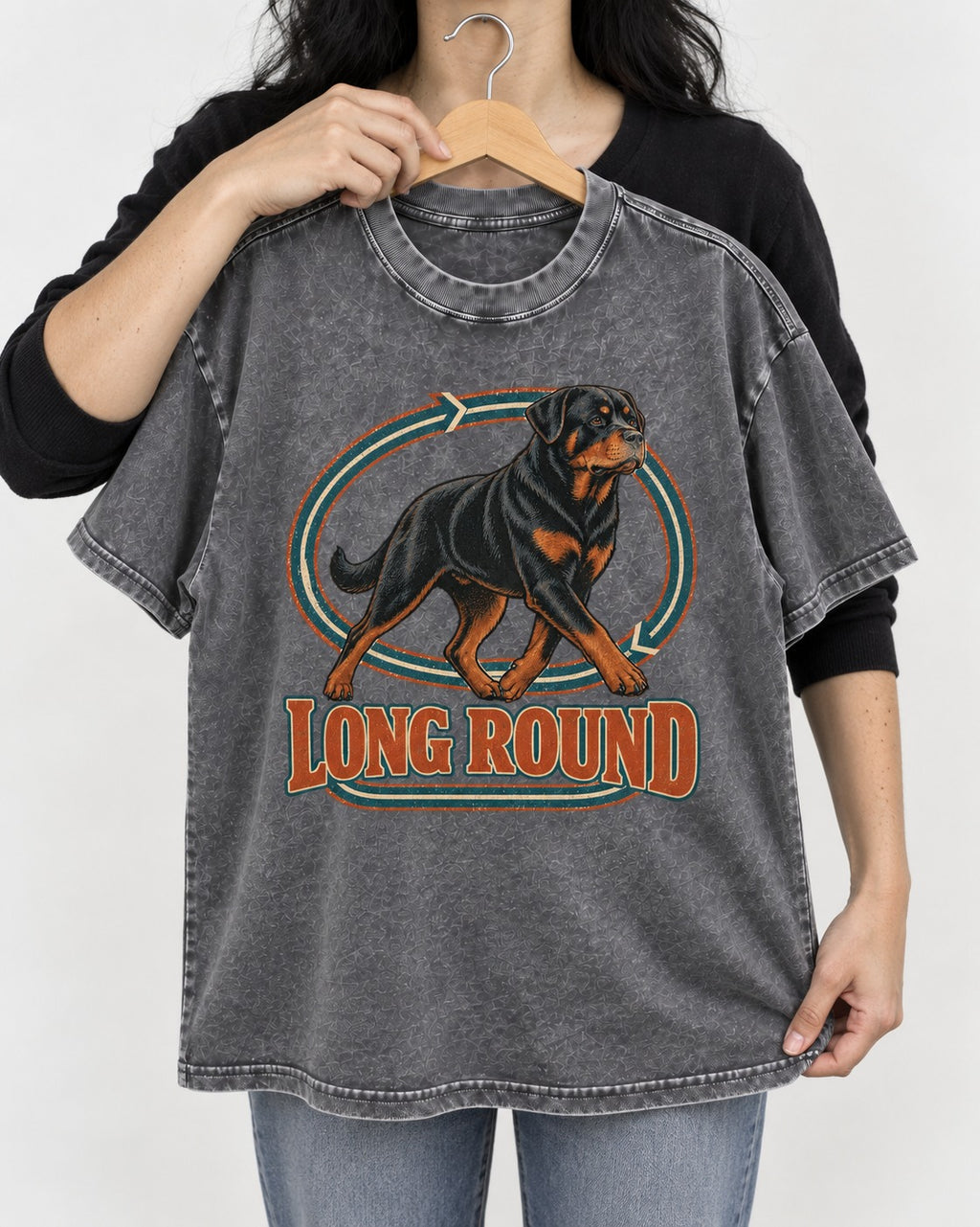 Rottweiler Long Round Circular Track Graphic Washed Tee in Gray, held up on a hanger