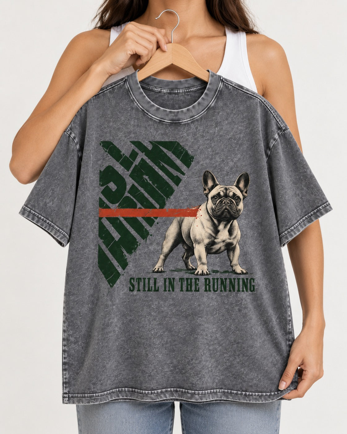 Frenchie Still in the Running Washed Tee in Gray, held up on a hanger