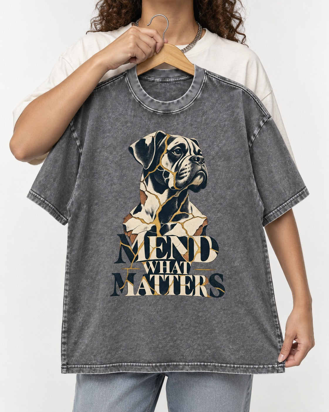 Mend What Matters Boxer Kintsugi Portrait Washed Tee in Gray, held up on a hanger