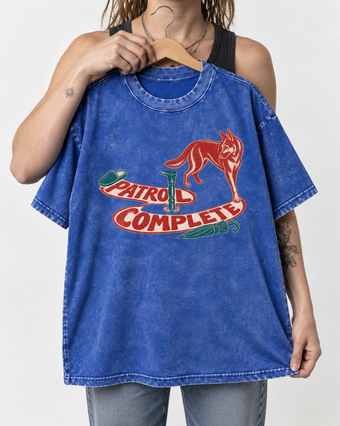 German Shepherd Dog Patrol Complete Umbrella Graphic Washed Tee in Royal Blue, held up on a hanger