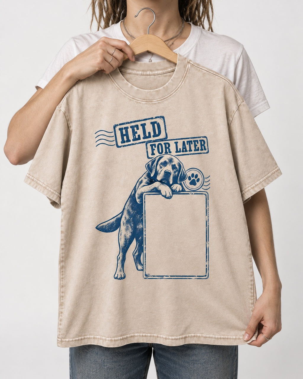 Held for Later Labrador Retriever Washed Tee in Apricot, held up on a hanger