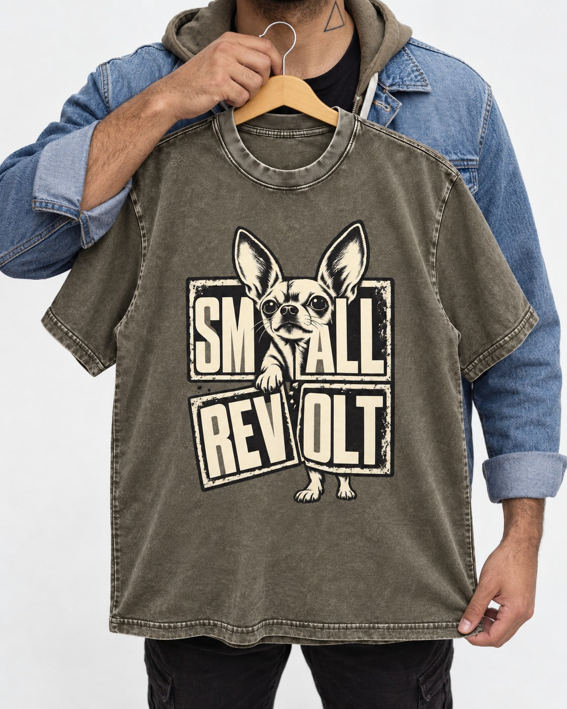 Chihuahua Small Revolt Broken Grid Graphic Washed Tee in Army Green, held up on a hanger
