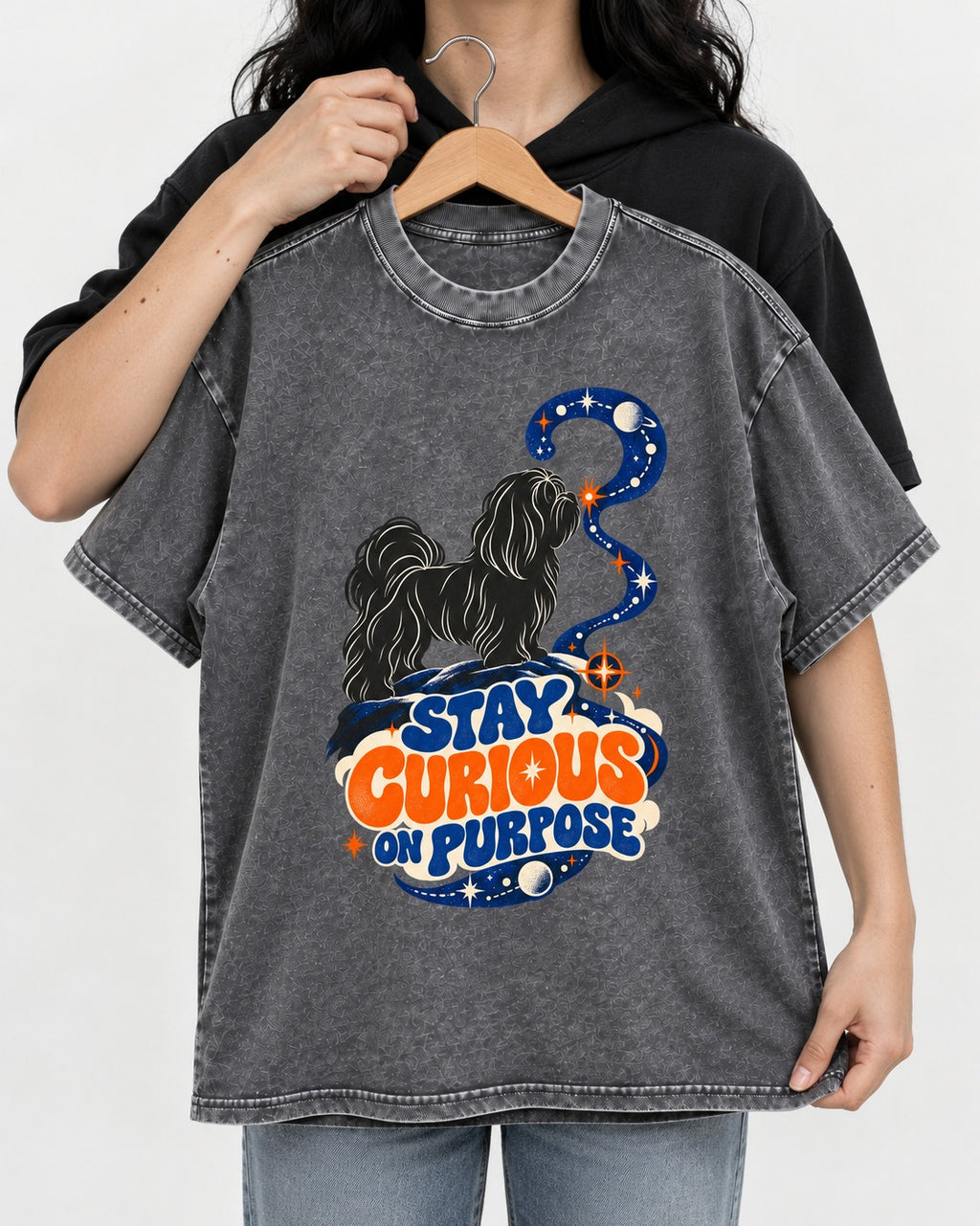 Stay Curious on Purpose Shih Tzu Washed Tee in Gray, held up on a hanger